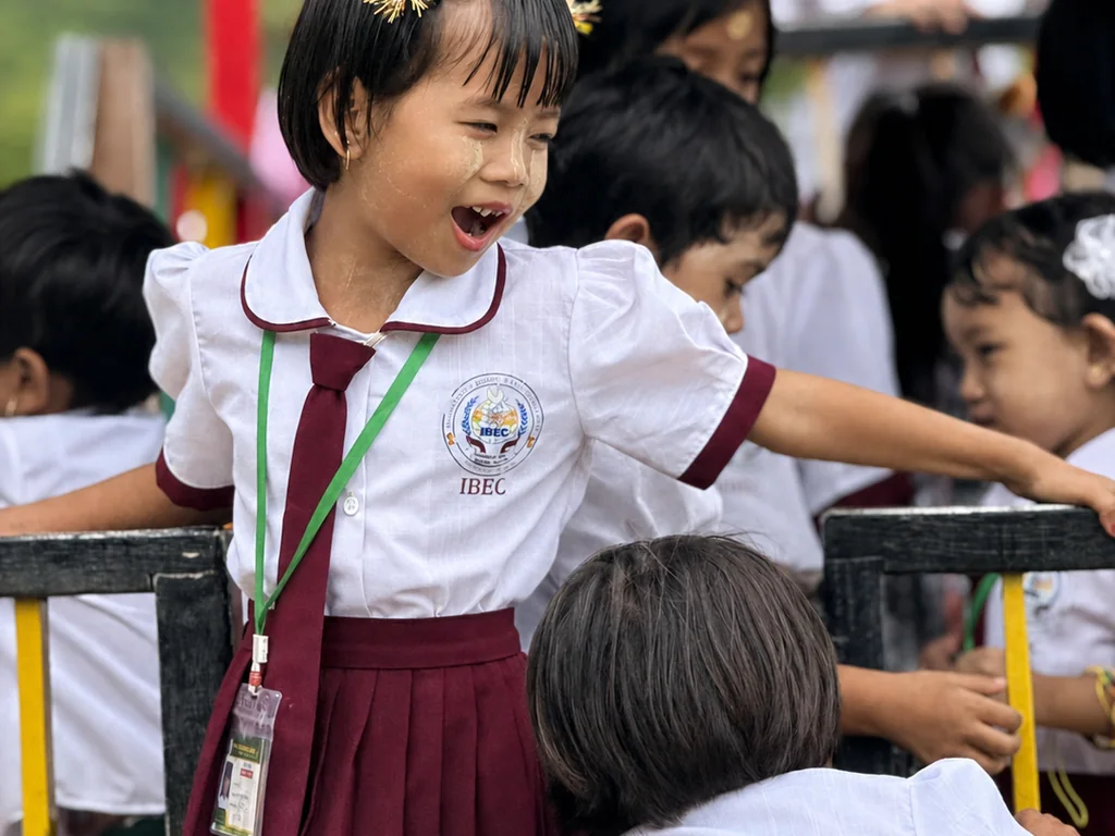 An IBEC primary student enjoying a school activity with classmates